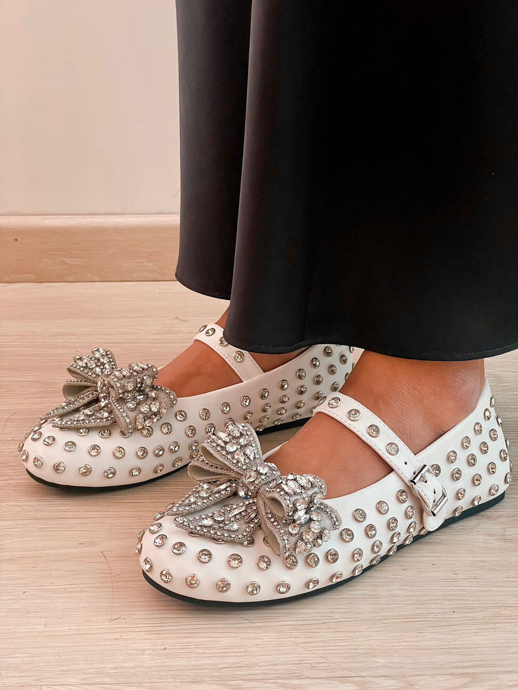 White Dimonte Studs Bow Embellished Ballerina Shoes by Prerto — side view