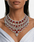 Niharika Diamond-Like Zircon Ovals with Ruby Square & Diamonds Statement Necklace & Jahnavi Ruby and Diamond-Like Zircon Compressed Setting Statement Necklace (Maharani Set)