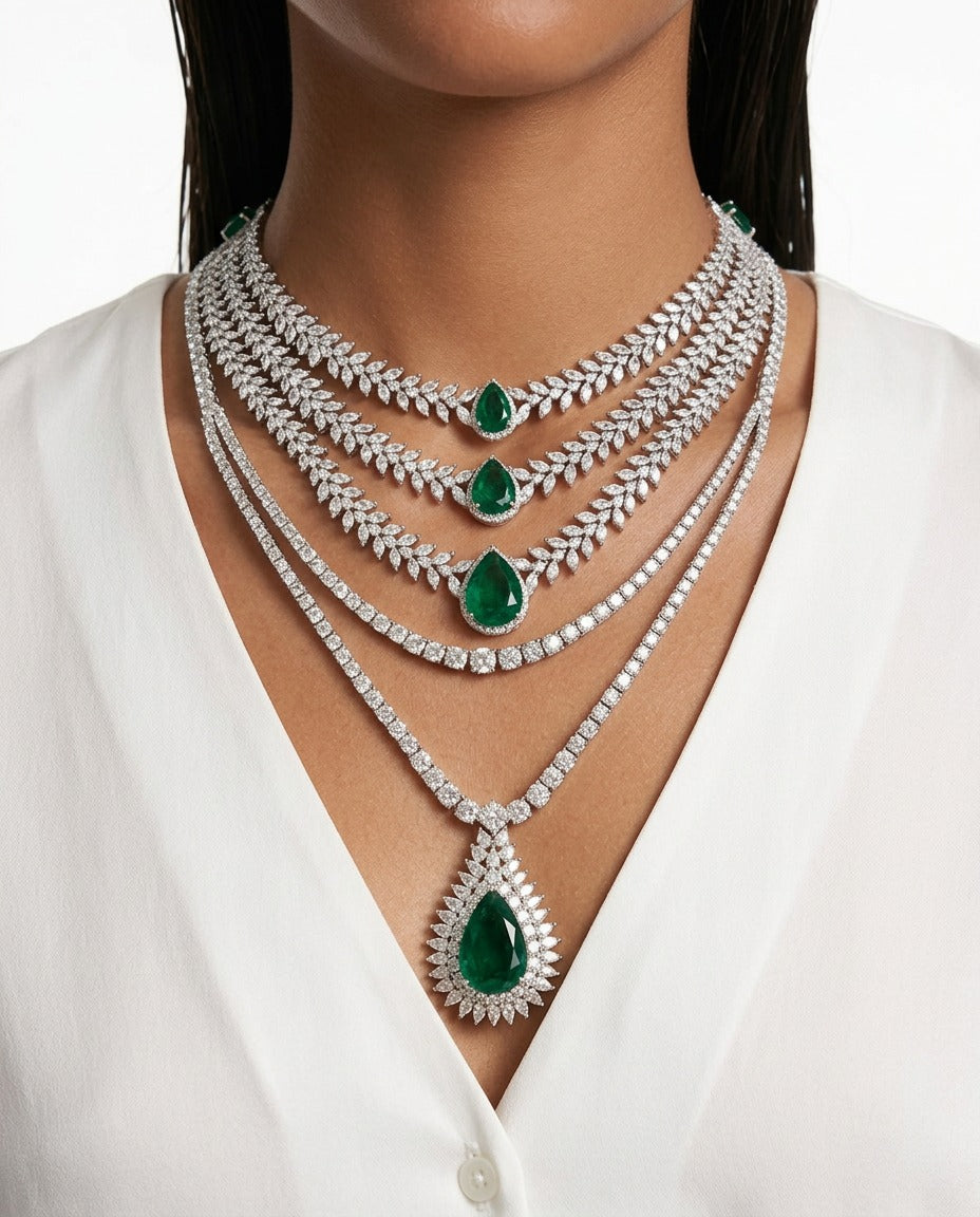 Maharani Veloura Emerald Diamond-Like Zircon Double-Layer Necklace & Noéline Emerald Diamond-Like Zircon Three Layer Statement Necklace Set – 2 Necklaces & Earrings