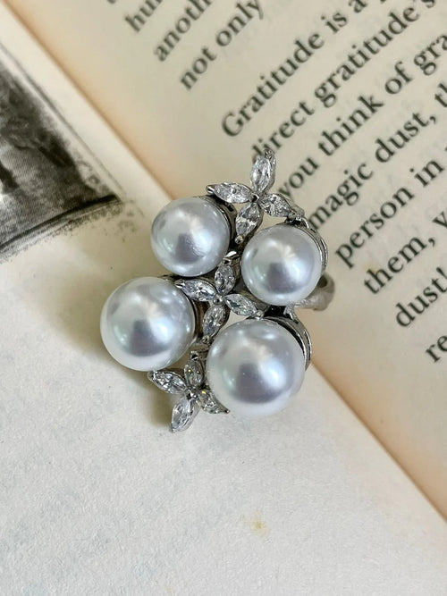 Pearly Silver Dimonte Floret Necklace & Earrings Set — flat lay — Prerto