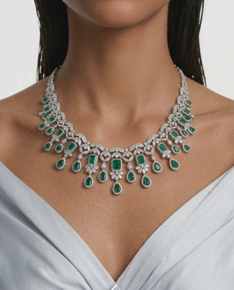 Aarvi Diamond-Like Zircon with Emeralds Statement Necklace Set (Necklace & Earrings)