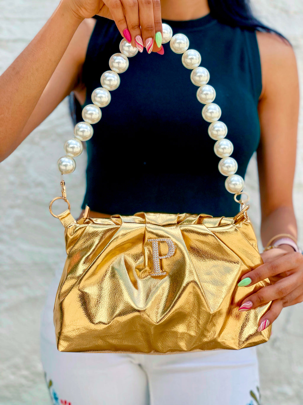 Personalised Gold Ruched Bag by Prerto — styled view