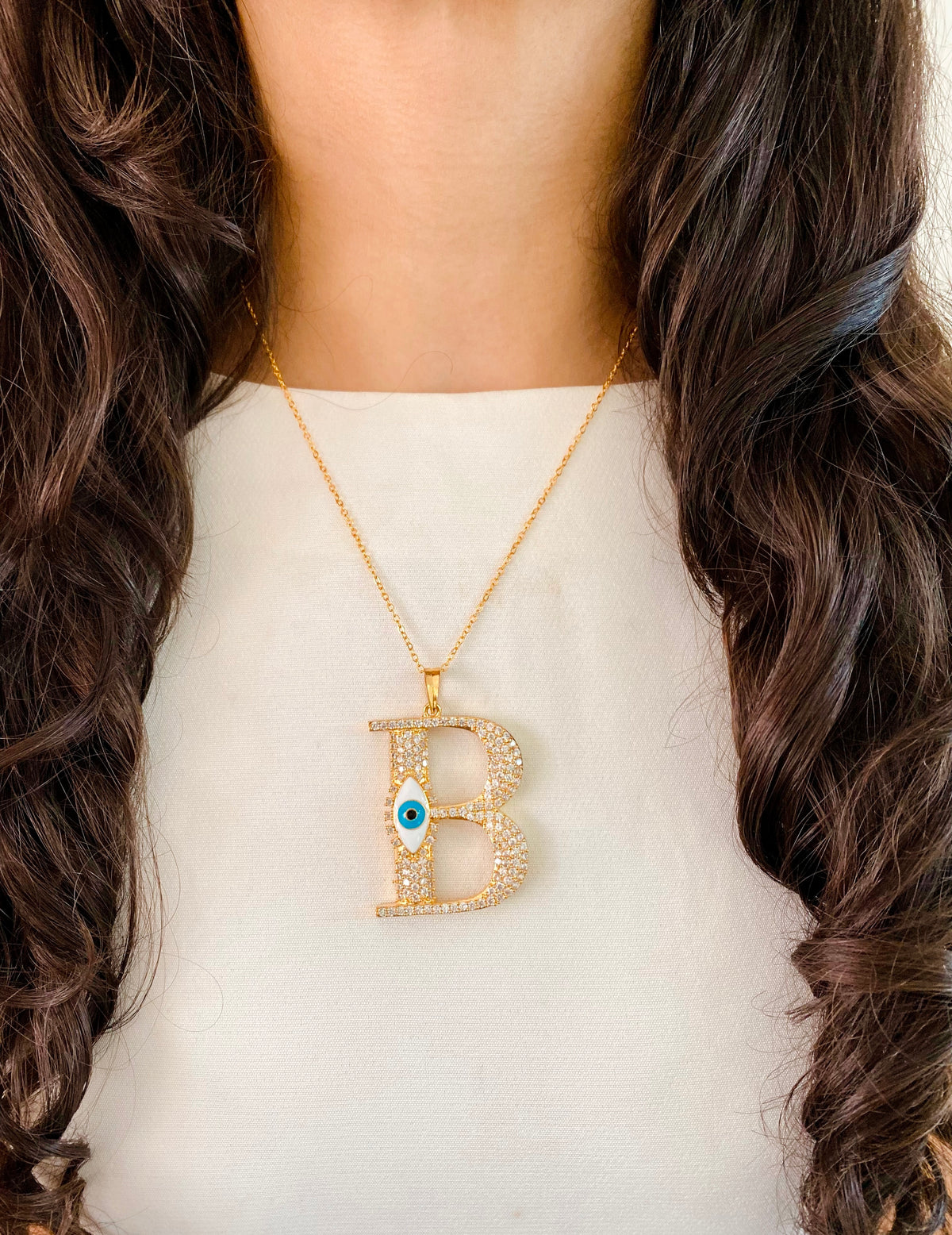 Evil Eye Gold Initial Pendant Necklace — side view — Prerto