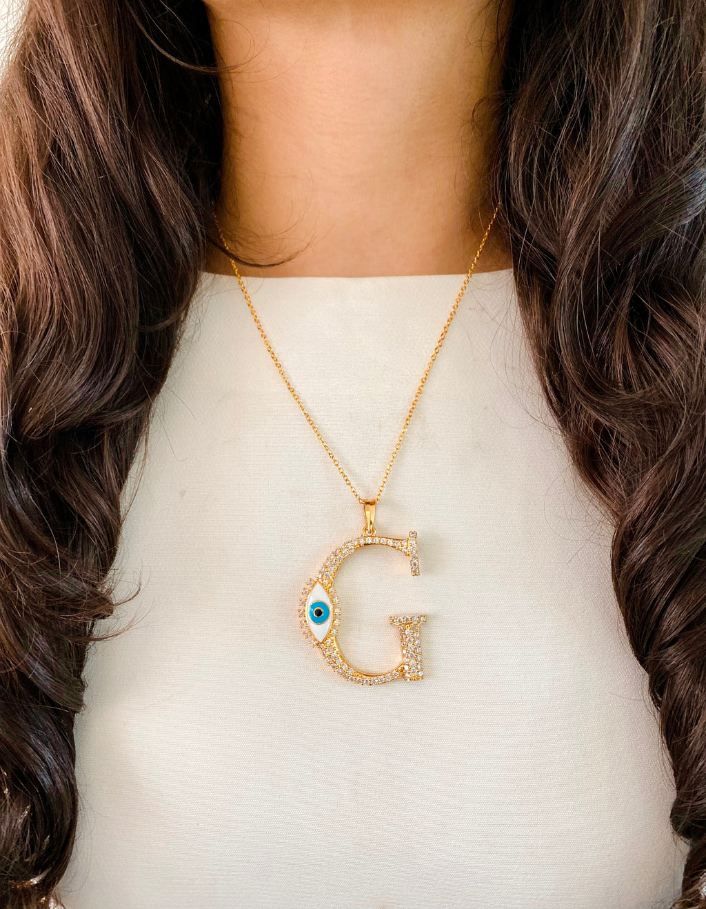 Evil Eye Gold Initial Pendant Necklace — worn on model — Prerto