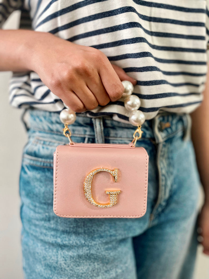 Personalised Light Pink Nano Bag by Prerto — styled view