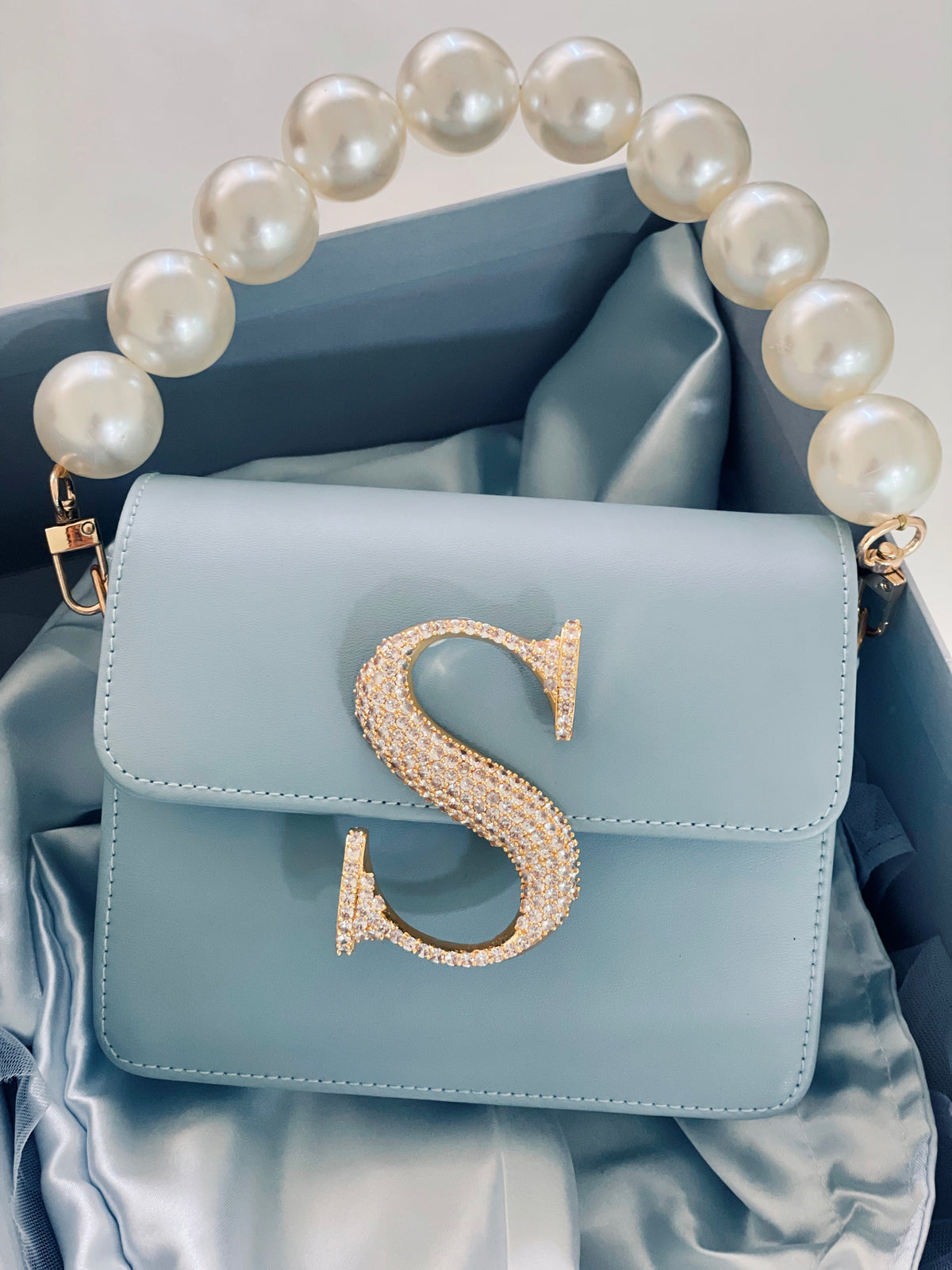 Personalised Powder Blue Crossbody Bag by Prerto — flat lay