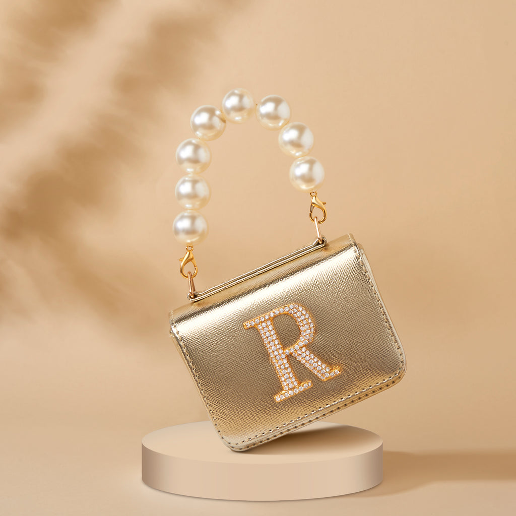 Personalised Gold Nano Bag by Prerto — flat lay