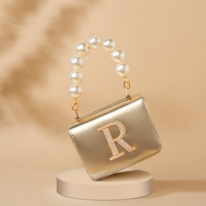 Personalised Gold Nano Bag by Prerto — flat lay
