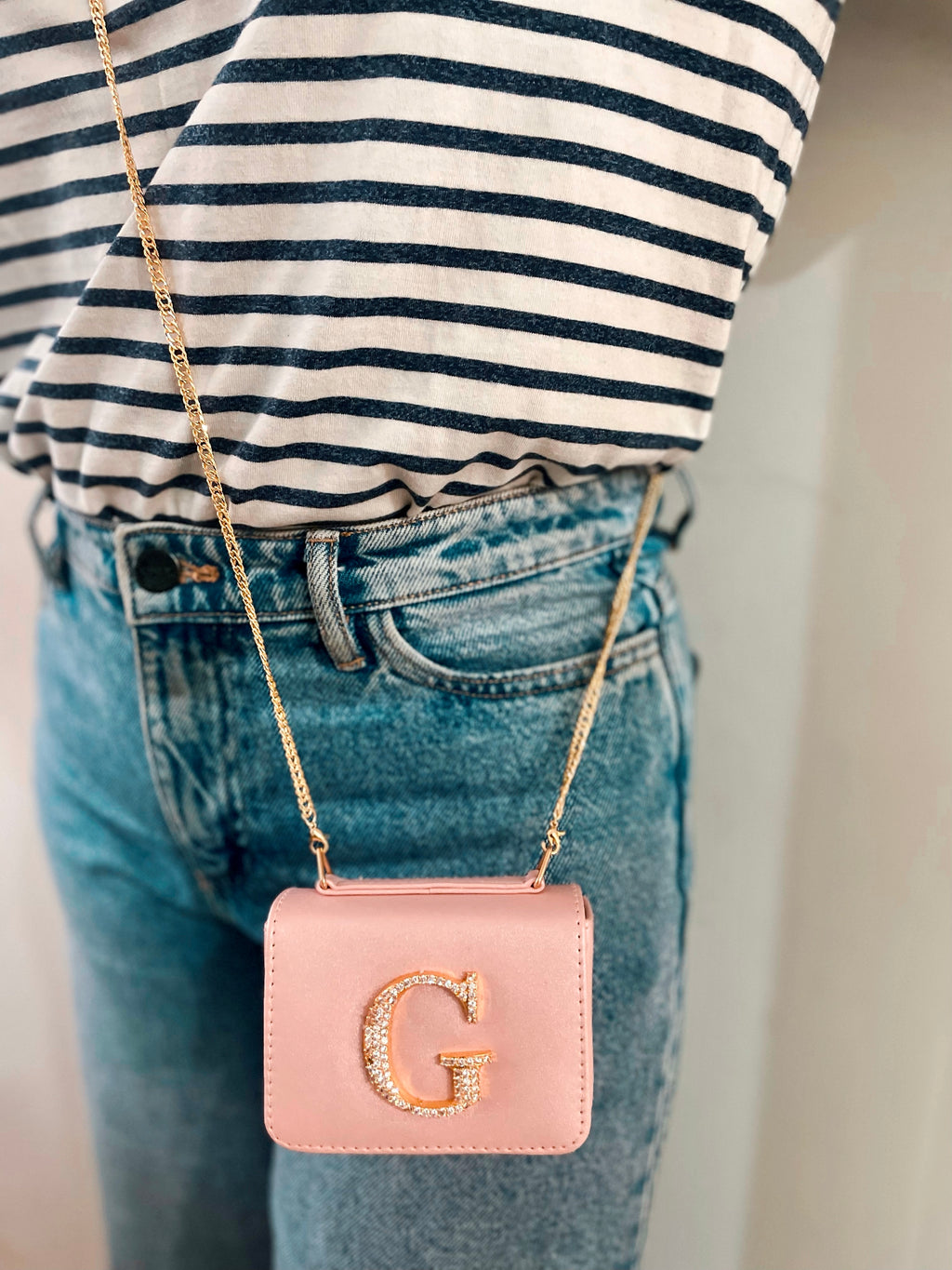 Personalised Light Pink Nano Bag by Prerto — worn on model