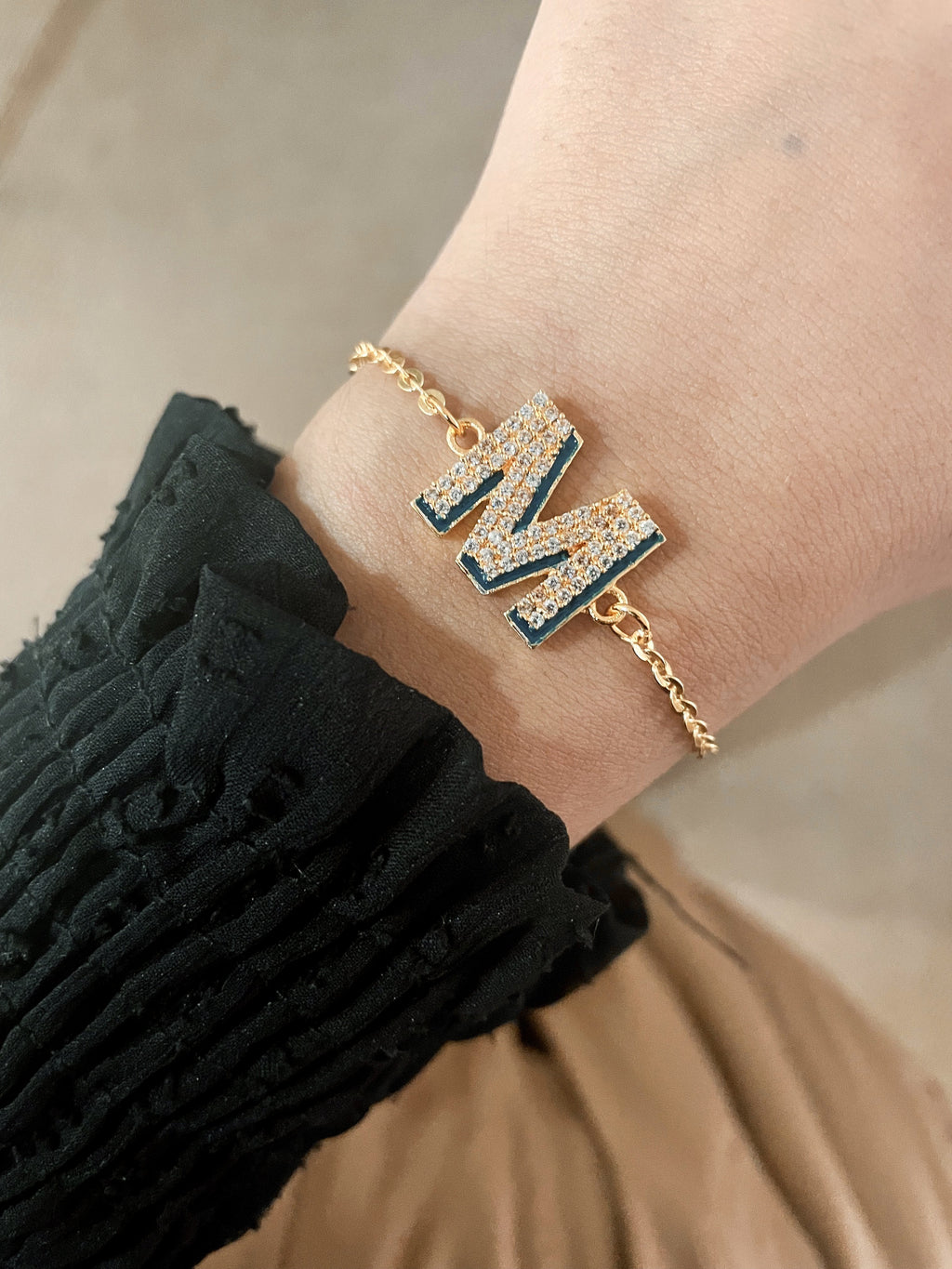 Shadow Iniziale Gold Initial Charm Bracelet — worn on wrist — Prerto